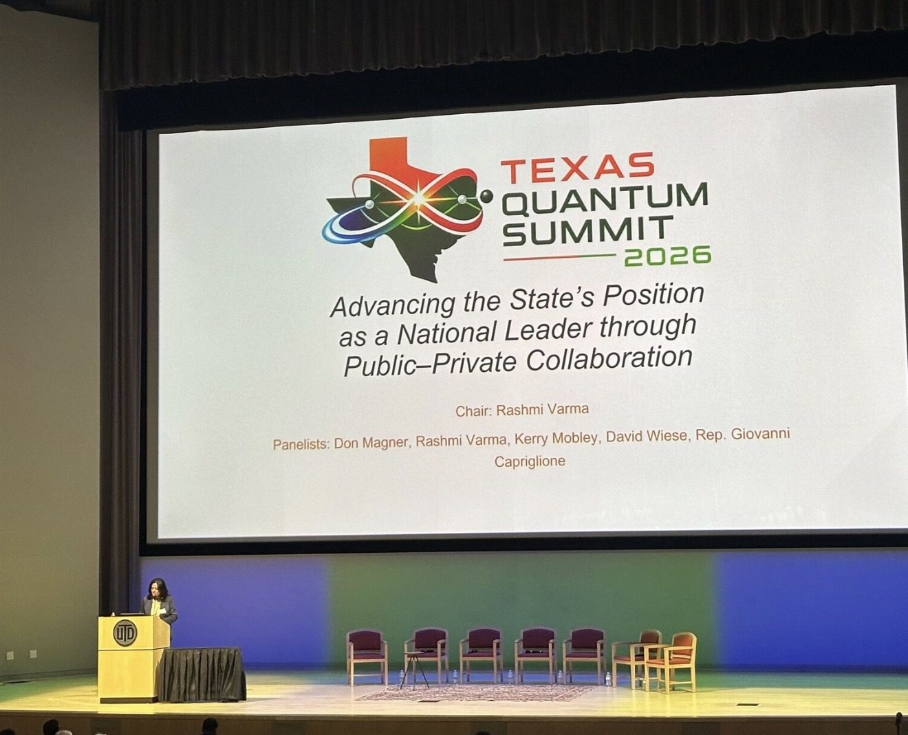 The Texas Quantum Summit 2026 main stage during the TQEA panel session, UT Dallas.